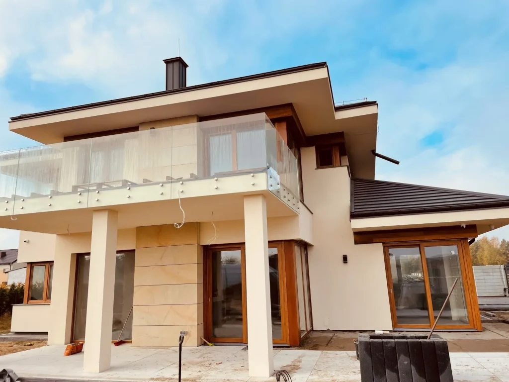 Energy-efficient two-storey house with envelope roof and garage poland