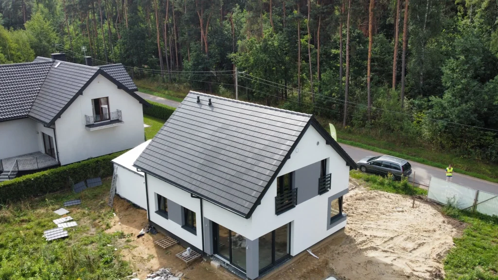 House with usable attic, gable roof and garage less than 110 m2